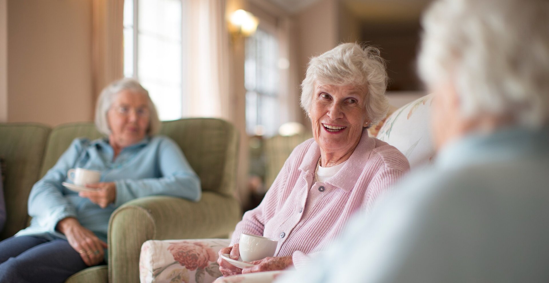 two senior ladies on a bench